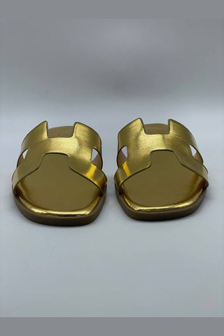 Buy gold Las sandalias planas tipo pala en tonos metalizados