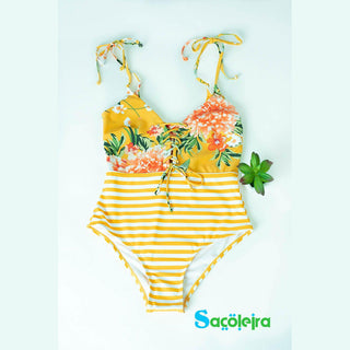 YELLOW ONE PIECE SWIMSUIT WITH DENOUNCED NECKLINE WITH FLORAL AND STRIPES SCORED BOW